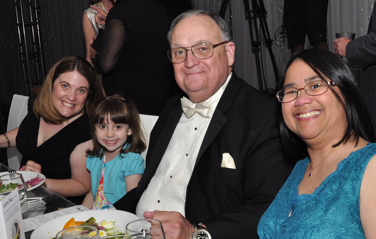 Bill Edwards with his two daughters and granddaughter