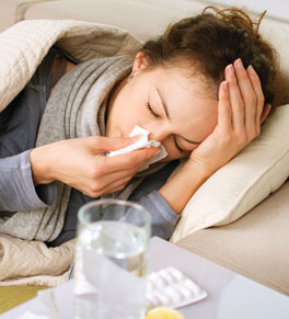 woman with flu, coughing, sneezing, sick