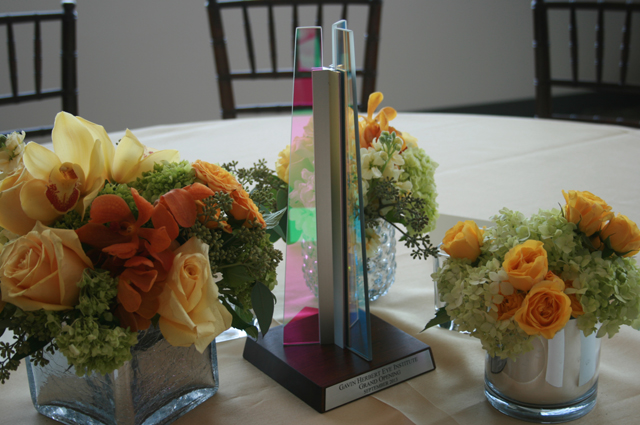 Keepsake centerpieces commemorate the grand opening of the new home for the Gavin Herbert Eye Institute at UC Irvine.