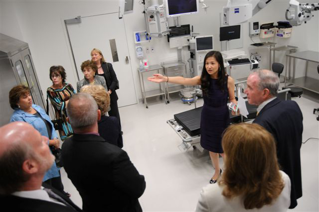 UCI Health eye surgeon Dr. Stephanie Lu leads a tour of surgical suites at the new Gavin Herbert Eye Institute