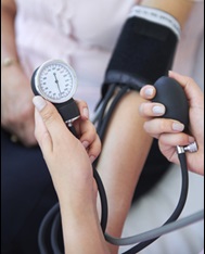 person getting blood pressure checked to prevent stroke