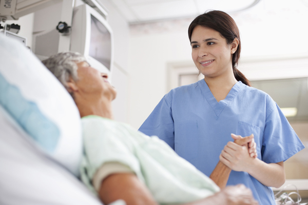 nurse comforting stroke patient