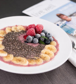 smoothie bowl with bananas, fruit, chia seeds