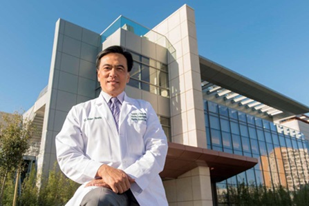 UCI Health dr. kenneth chang in front of the cddc
