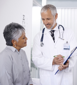 physician discussing cataract surgery with patient