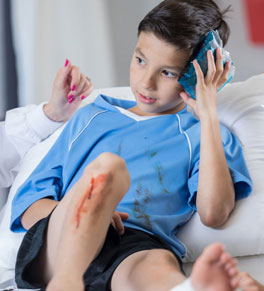 boy with concussion at doctor's