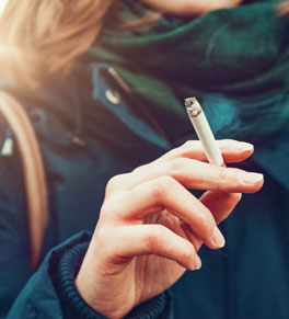 woman smoking a cigarette