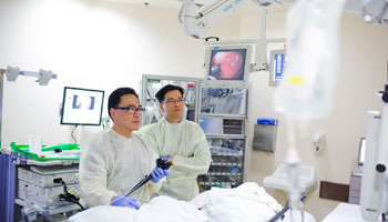 doctors giving a colonoscopy