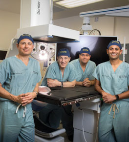 Drs. Jaime Landman, Ralph Clayman, Ramy Yaacoub and Roshan Patel show off UCI Health’s new Dornier Gemini system to treat kidney stones