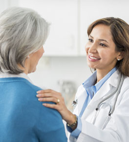 doctor talking with breast cancer patient