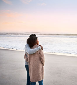 women standing on beach after organ donation