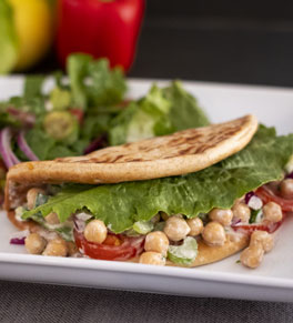chickpea salad in pita with side salad