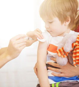 boy getting the measles vaccine