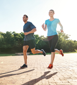 man and woman jogging to reduce stroke risk