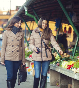 two women shopping for food