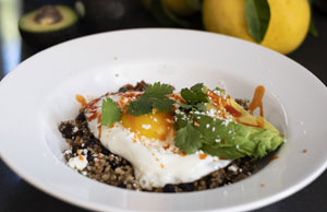 quinoa bowl with egg, black beans, avocado