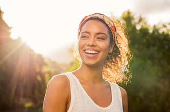 young woman looking happy