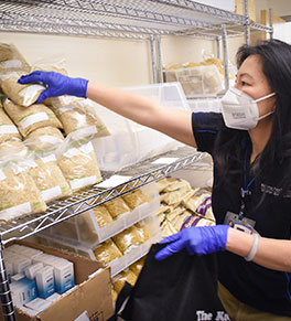 Caregiver shops in the commissary UCI Health created for its healthcare workers amid the novel coronavirus pandemic.