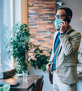 Office worker wears a mask