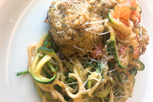 Spiral zucchini with chicken pesto meatballs
