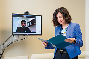 UCI Health neuro-oncologist conducts a telehealth visit with glioblastoma survivor Daniel Boyd.