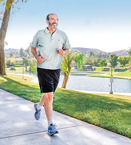 UCI Health glioblastoma survivor Daniel Boyd takes his daily run in Chino Hills.