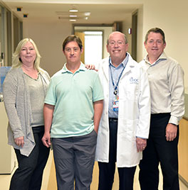 UCI neurosciences researcher Elizabeth Head, PhD, research participant Jeremy Throckmorton, Dr. Ira Lott and Eric Doran are studying the connection between Alzheimer's disease and Down syndrome.