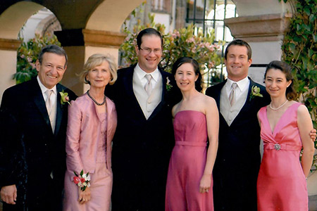 UCI Health Dr. Thomas Cesario poses with his wife, Mary, at a recent wedding with their four children: Dr. David Cesario, Karrie Heneman, PhD, Doug Cesario and UCI Health Dr. Kristen Kelly, 