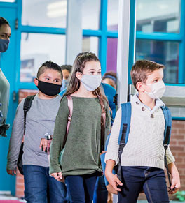 Children return to school in uncertain times.
