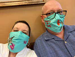 LeeAnn and Mike Brill wait for her presurgical physical at UCI Health Pacific Breast Breast Care Center in July 2021.