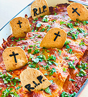 Try this savory dish of pumpkin enchiladas and add your own graveyard chip markers.