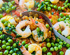 Holiday shrimp paella with peas and brown rice