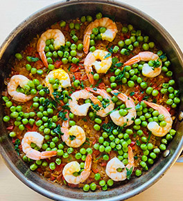 Holiday shrimp paella with peas and brown rice