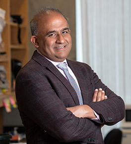 UCI Health dermatologist and melanoma scientist Dr. Anand Ganesan in his lab at UC Irvine.