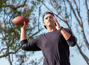 Former NFL linebacker Vince Bruno has full mobility of his neck and back thanks to a unique spine procedure performed at UCI Health.