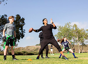 Former NFO linebacker Vince Bruno drills his flag football team, the Seahawks.