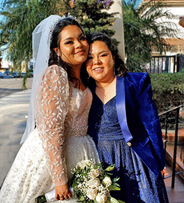 Xenia Morales poses with her sister and maid of honor, Nadia Morales, who donated a kidney eight years ago that has allowed the young bride to thrive.