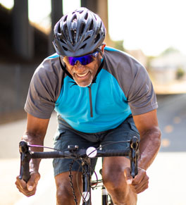 Man stays fit with a morning bike ride.