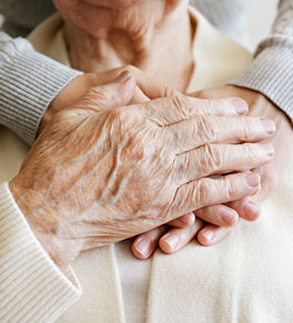 one pair of an older person's hands on top of someone younger uci health advocates end of life planning for adults of all ages and health