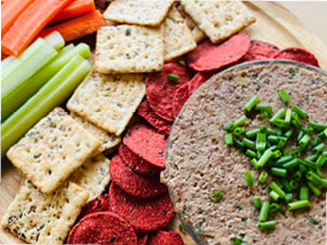 Lentil mushroom pate' served with crackers and crudite'.