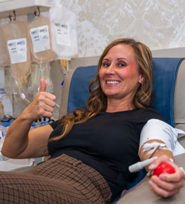UCI Health respiratory care specialist Trista Kallis, a regular blood donor, on a recent visit to the UCI Health Blood Donor Center — Orange.