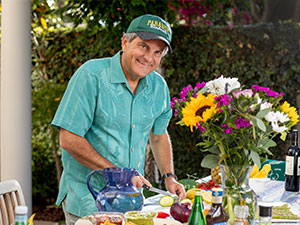 Dr. Gerald McGuire having a healthy BBQ on his outside patio.