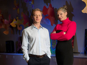 UCI researcher Maksim Plikus, left, stands next to with UCI Health dermatologist Dr. Natasha Mesinkovska,