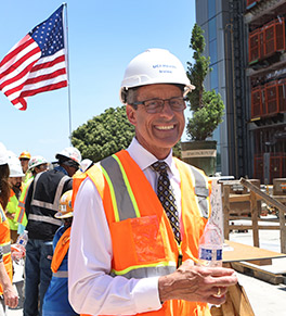 Dr. Michael J. Stamos, dean of the UCI School of Medicine, is exhilarated by the progress of construction at UCI Health — Irvine.