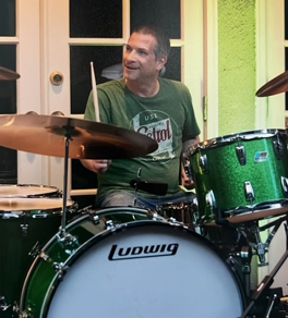 uci health colorectal cancer patient scott gertz playing the drums