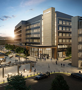 Architect's rendering of UCI Health — Irvine, the new seven-story, acute care hospital opening soon, shown at dusk.