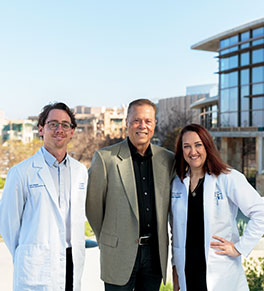 Dr. Samuel Spiegel, left, and Dr. Marjan Farid, right, teamed up to treat Bill Rowcliffe, center, whose vision was threatened by shingles.