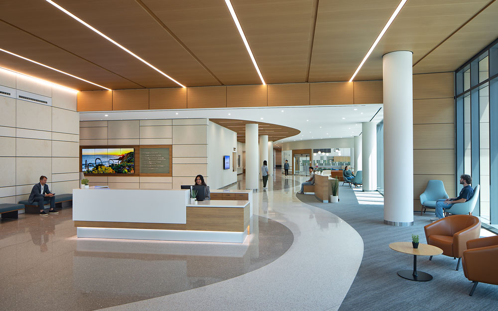 image of a waiting area filled with natural light at the uci health chao family comprehensive cancer center in irvine with patients sitting on safe, sustainable furniture