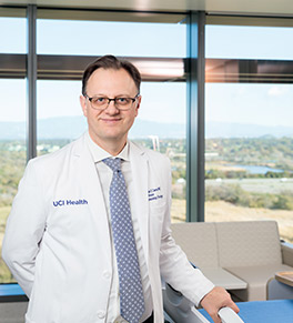 Dr. stefan O. Ciurea stands in one of the new adaptable hospital rooms at UCI Health — Irvine.