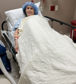 karen patterson in preop covered with a blanket waiting for her transplant at uci health — orange